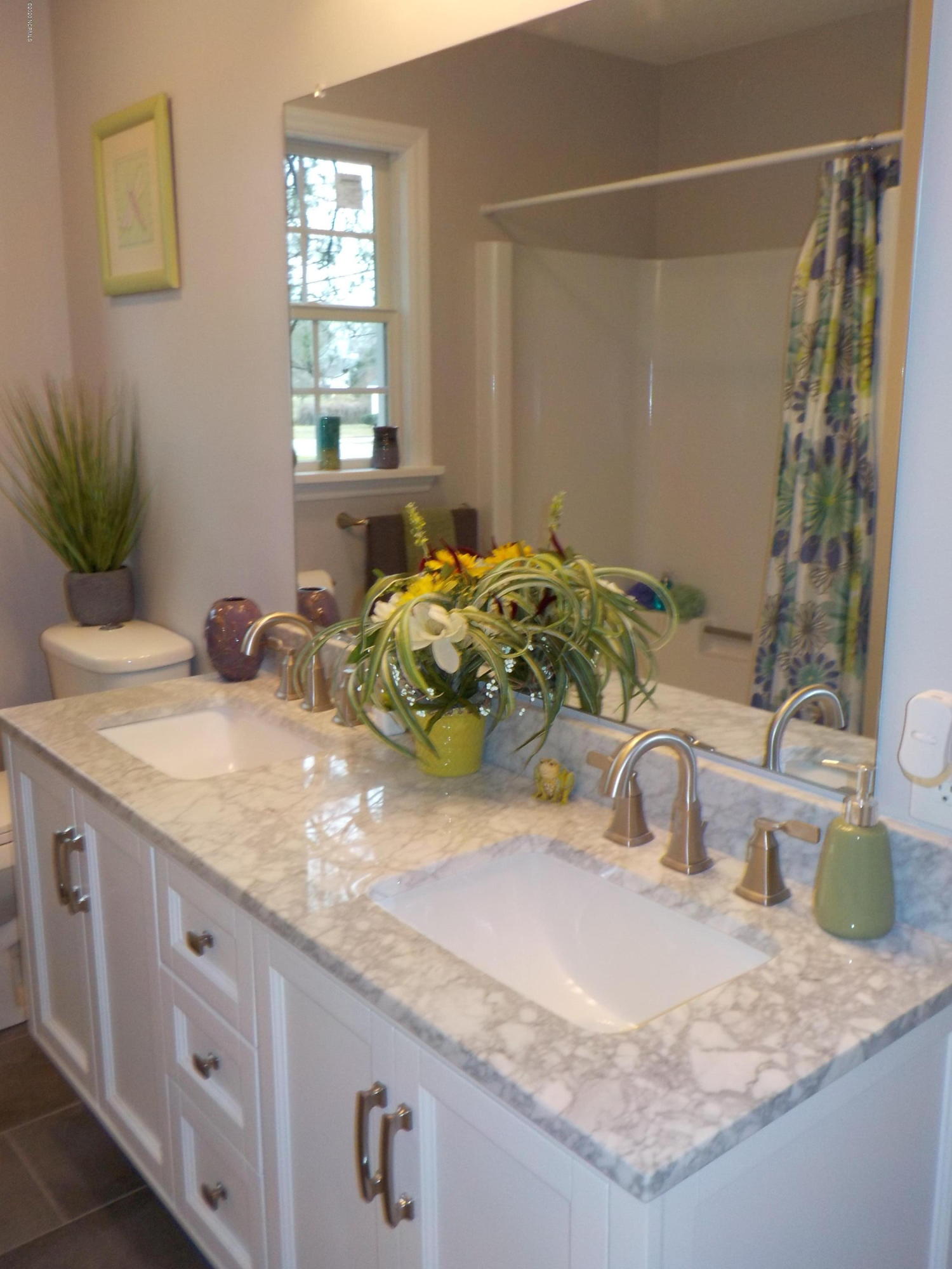 604 Mill Branch Road Rocky Mount, NC 27803 - Photo 12 of 24 floating double vanity with carrara marble top, new sinks, faucets