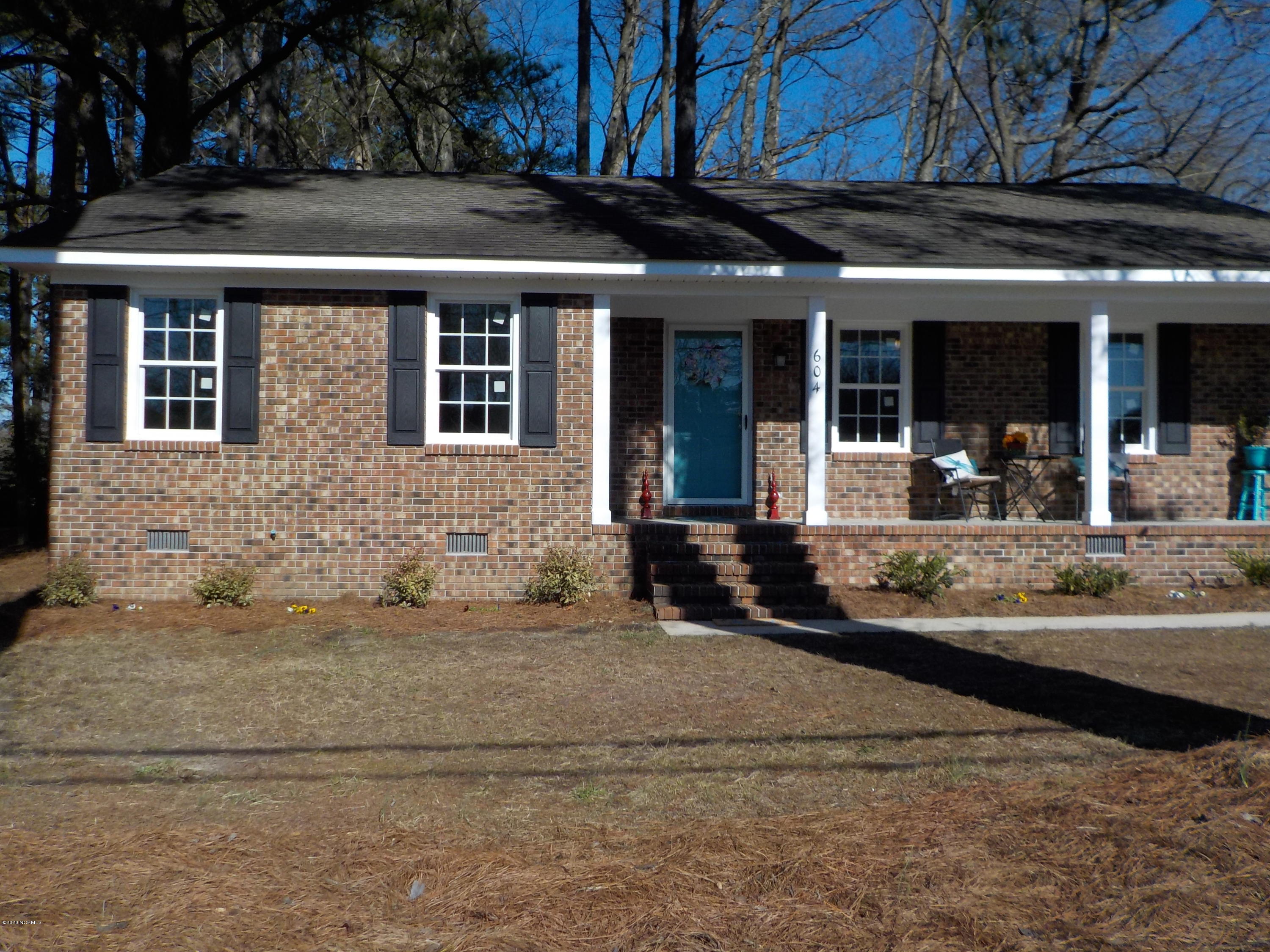 604 Mill Branch Road Rocky Mount, NC 27803 - Photo 24 of 24 nice rocking chair front porch, new vinyl windows, shutters, storm door, freshly landscaped
