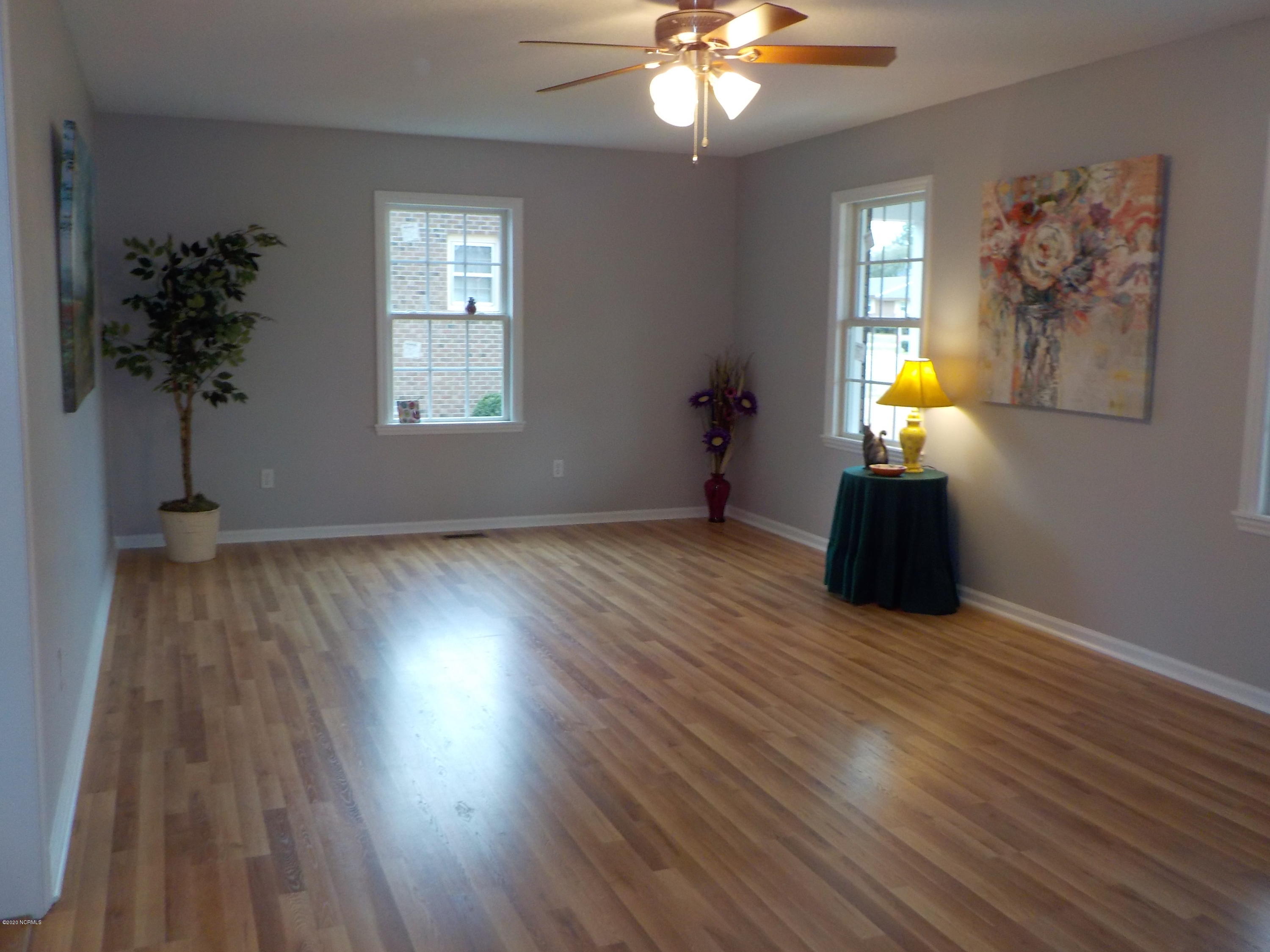604 Mill Branch Road Rocky Mount, NC 27803 - Photo 8 of 24 new wood laminate flooring, ceiling fan