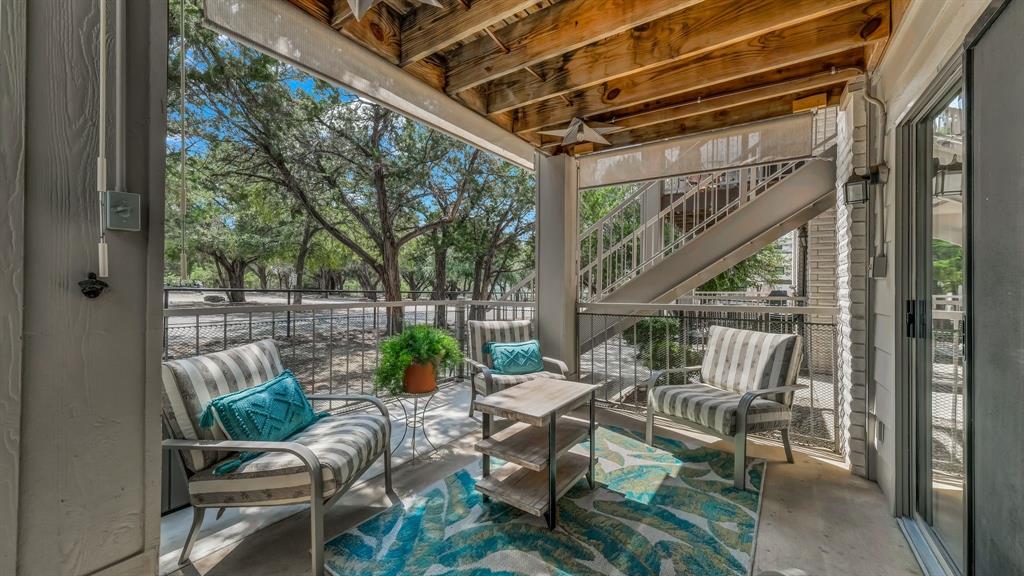 3059 Hells Gate Loop, Unit 7 Strawn, TX 76475 - Photo 30 of 36 a view of porch with furniture and garden view