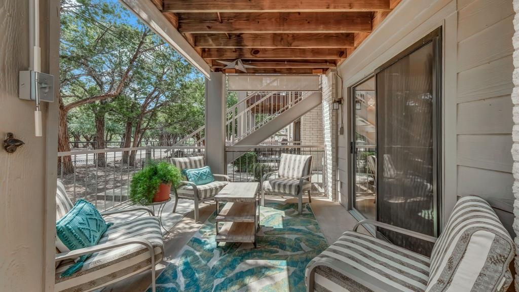 3059 Hells Gate Loop, Unit 7 Strawn, TX 76475 - Photo 31 of 36 a view of porch with seating space