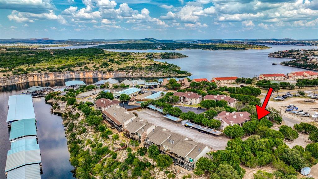 3059 Hells Gate Loop, Unit 7 Strawn, TX 76475 - Photo 34 of 36 a view of a city and lake view