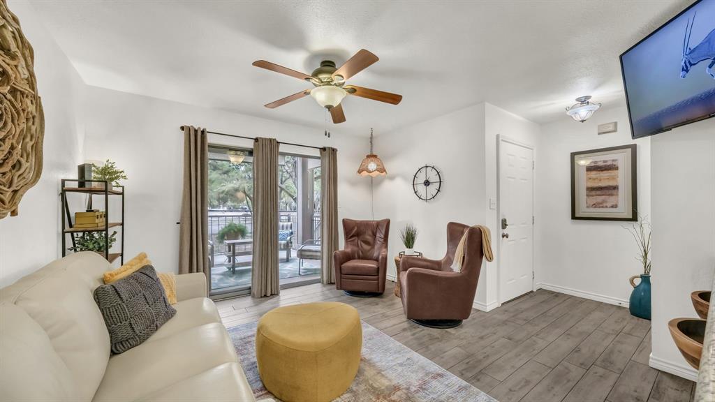 3059 Hells Gate Loop, Unit 7 Strawn, TX 76475 - Photo 4 of 36 a bedroom with furniture and a window