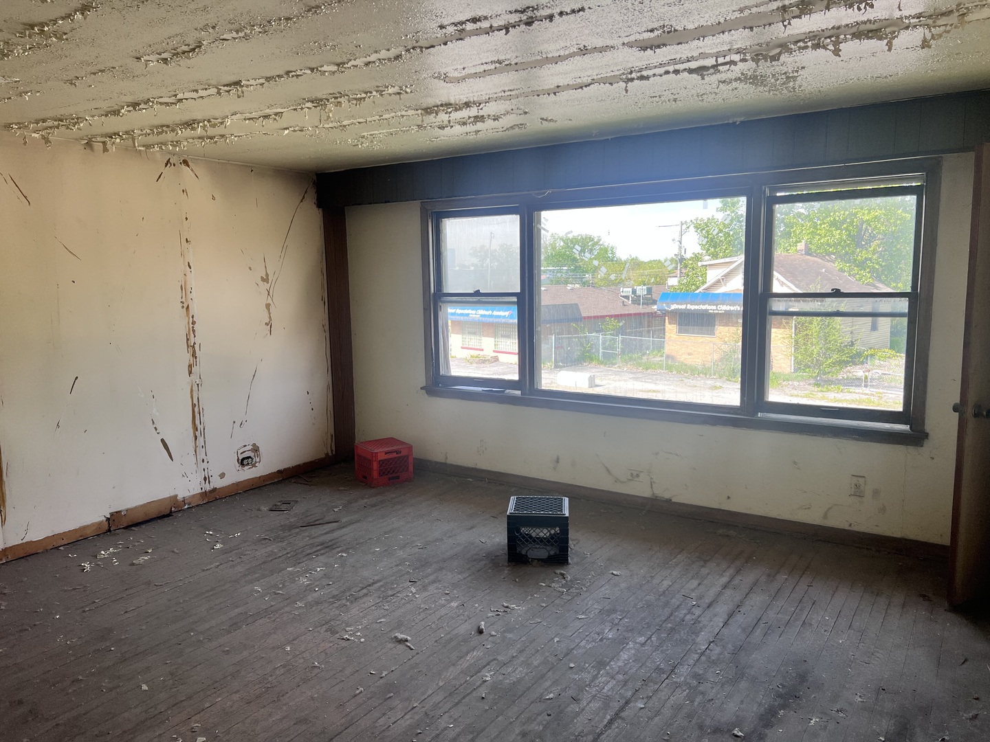 15711 Dixie Highway Harvey, IL 60426 - Photo 3 of 7 wooden floor and window in an empty room