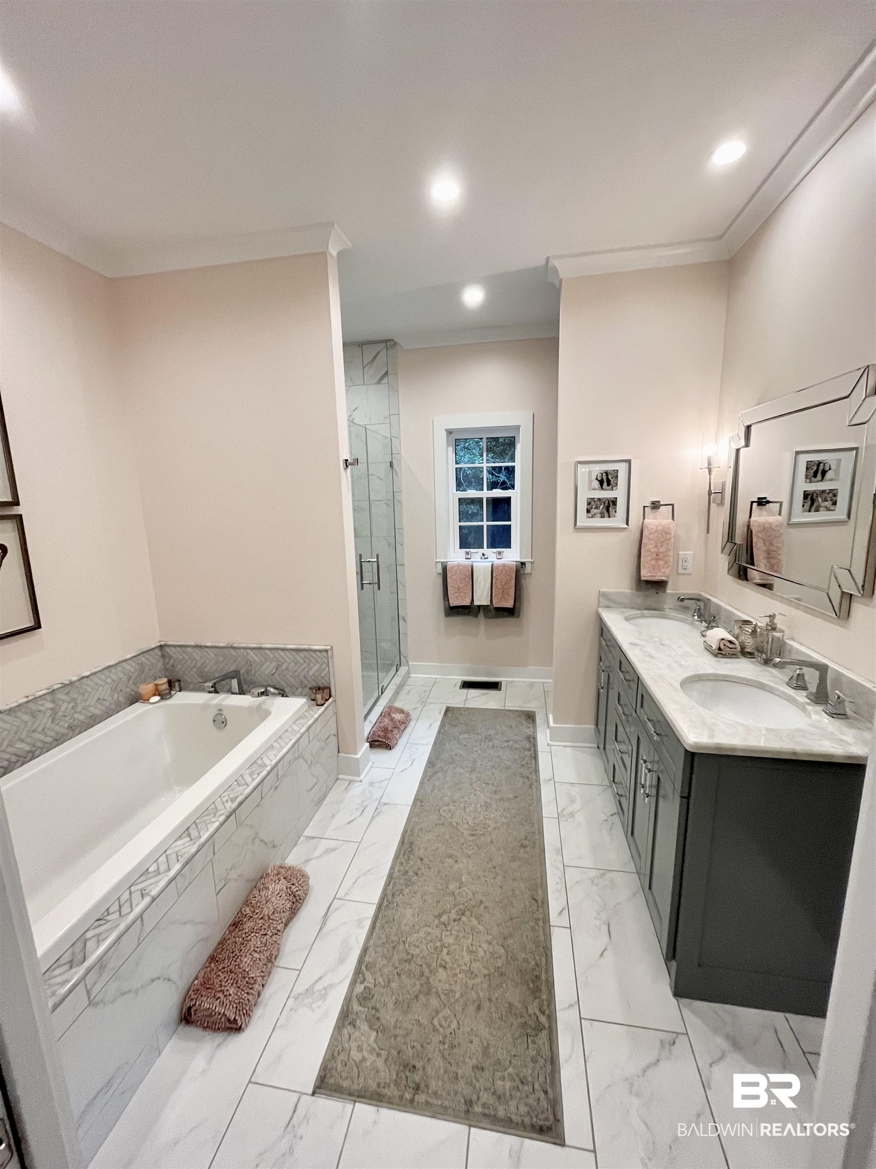 451 Ridgelawn Drive West Mobile, AL 36608 - Photo 8 of 41 Full bath with marble look tiles, crown molding, a stall shower, a bath, and double vanity