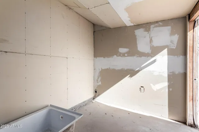 a view of a hallway with stairs