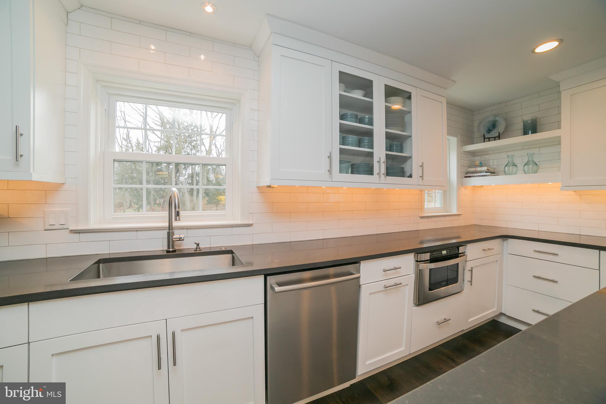 708 Monument Road Malvern, PA 19355 - Photo 12 of 39 Quartz countertops, subway tile back splash.
