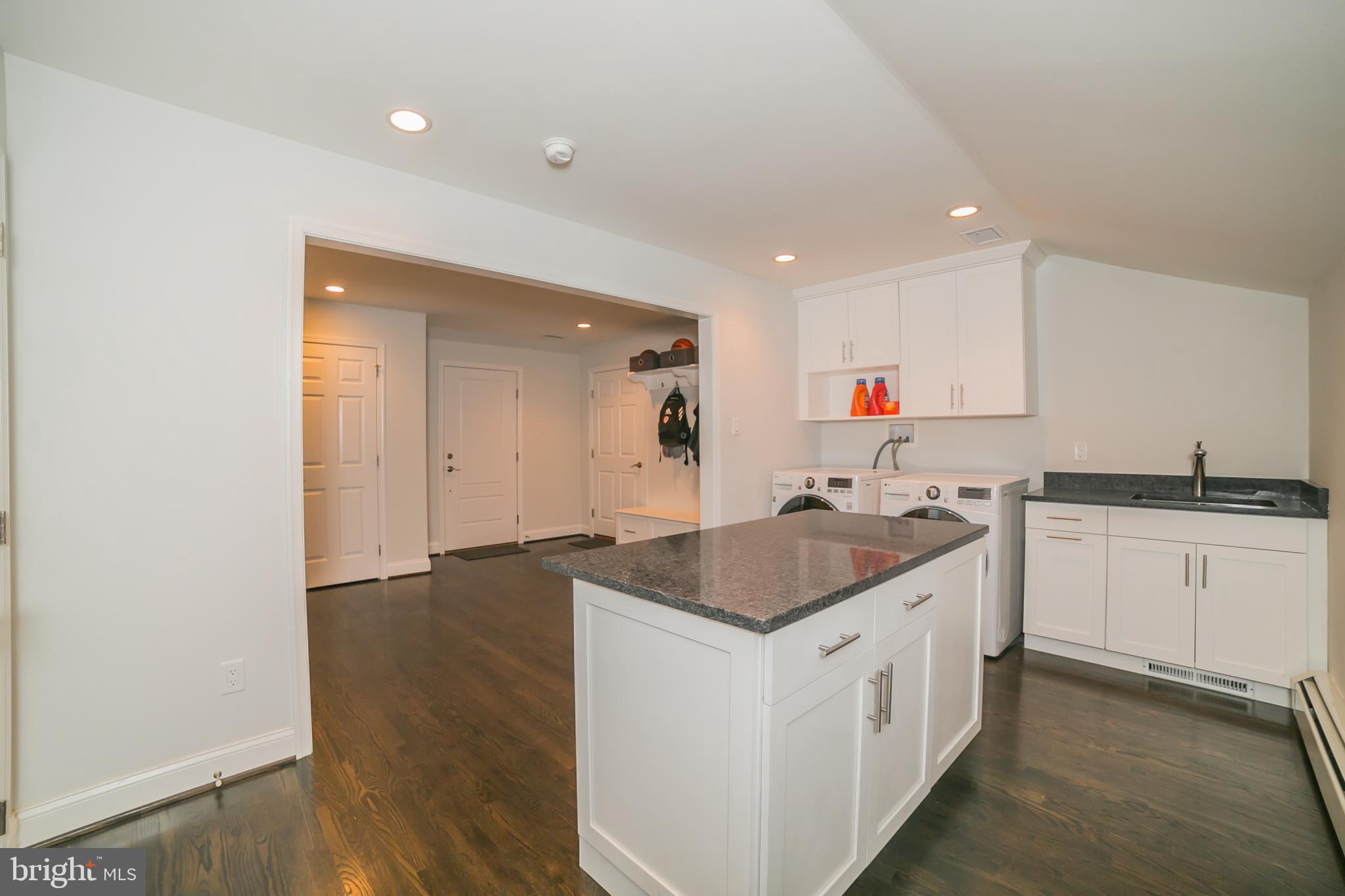 708 Monument Road Malvern, PA 19355 - Photo 26 of 39 Lower level mudroom and laundry room .