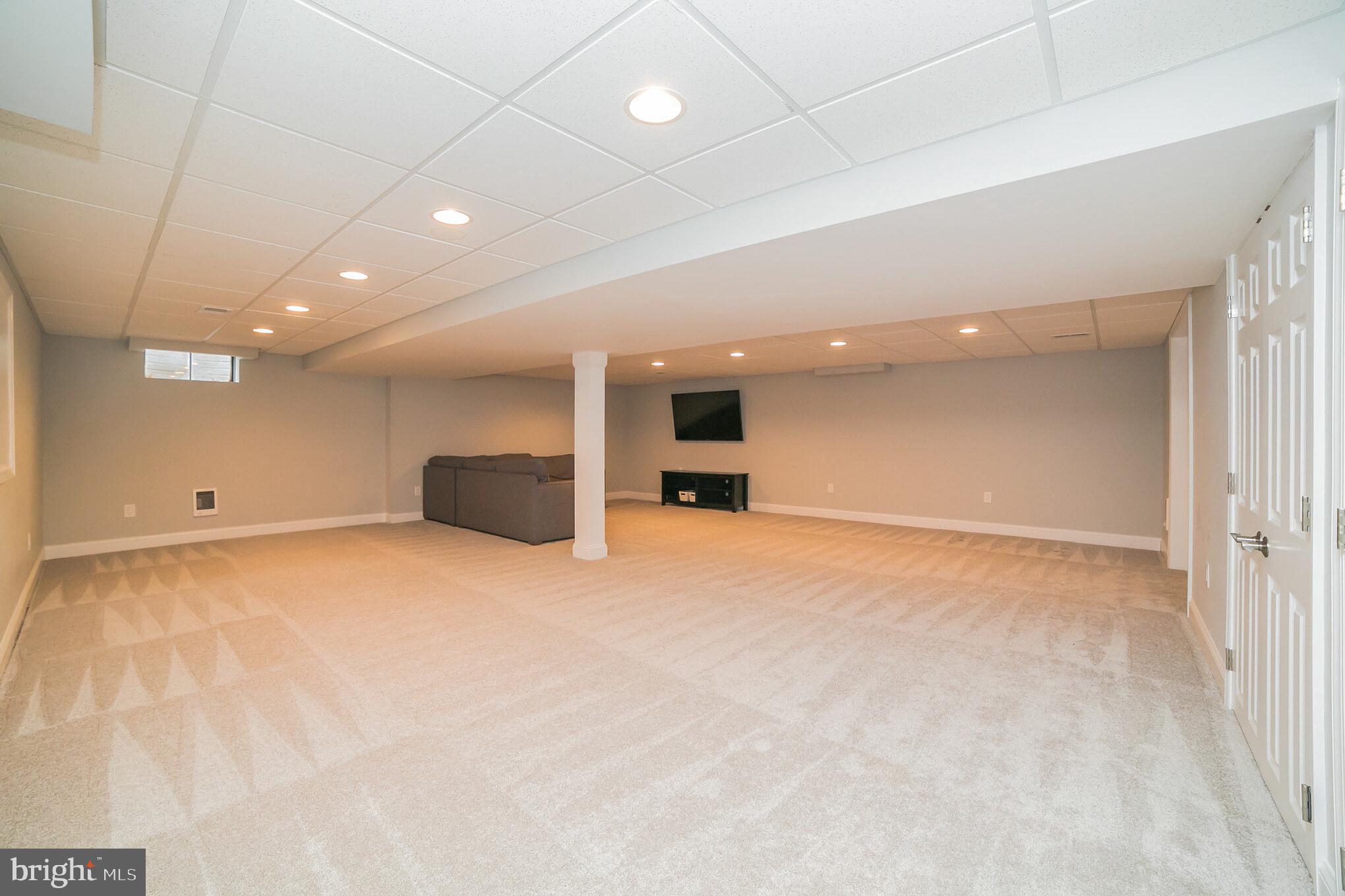 708 Monument Road Malvern, PA 19355 - Photo 27 of 39 Large, finished lower level recreation room.