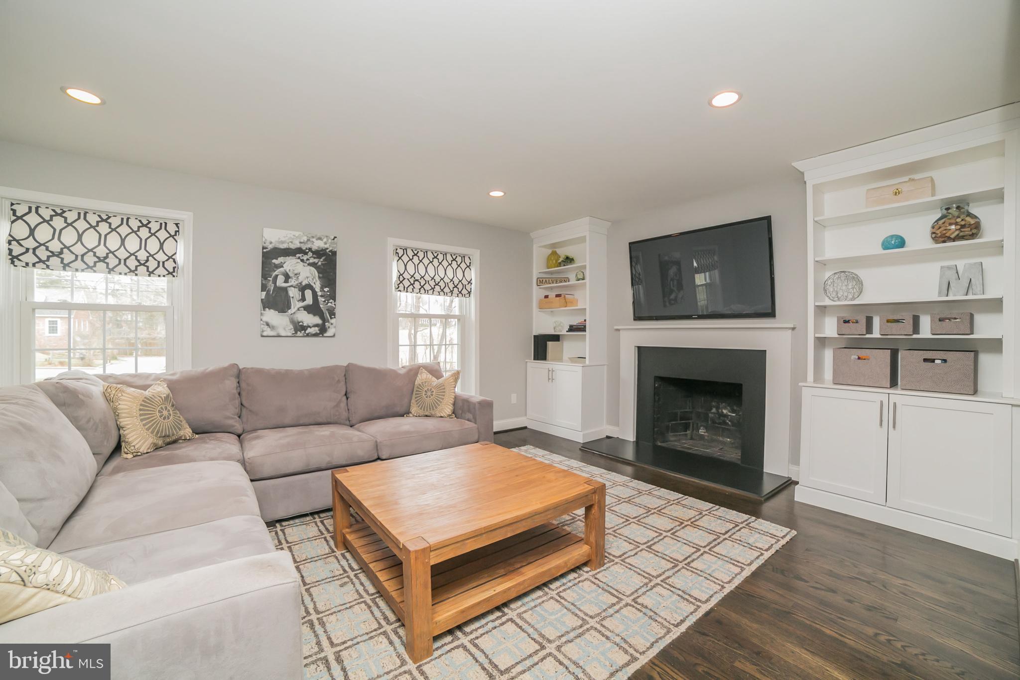 708 Monument Road Malvern, PA 19355 - Photo 7 of 39 Family room with built-in shelves & storage.