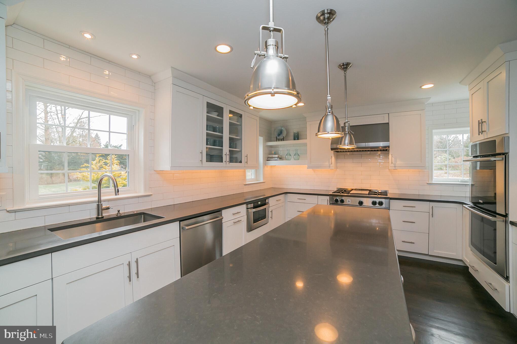 708 Monument Road Malvern, PA 19355 - Photo 10 of 39 White, shaker, soft close cabinets.