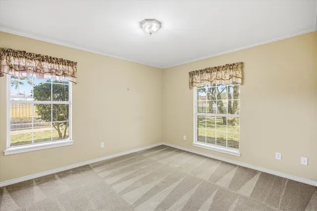 an empty room with windows