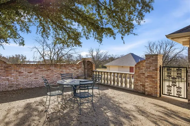 a bench sitting in front of a house