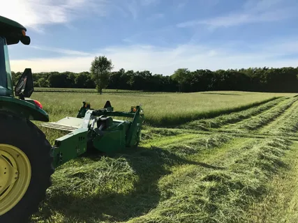 a view of swimming pool with sitting area