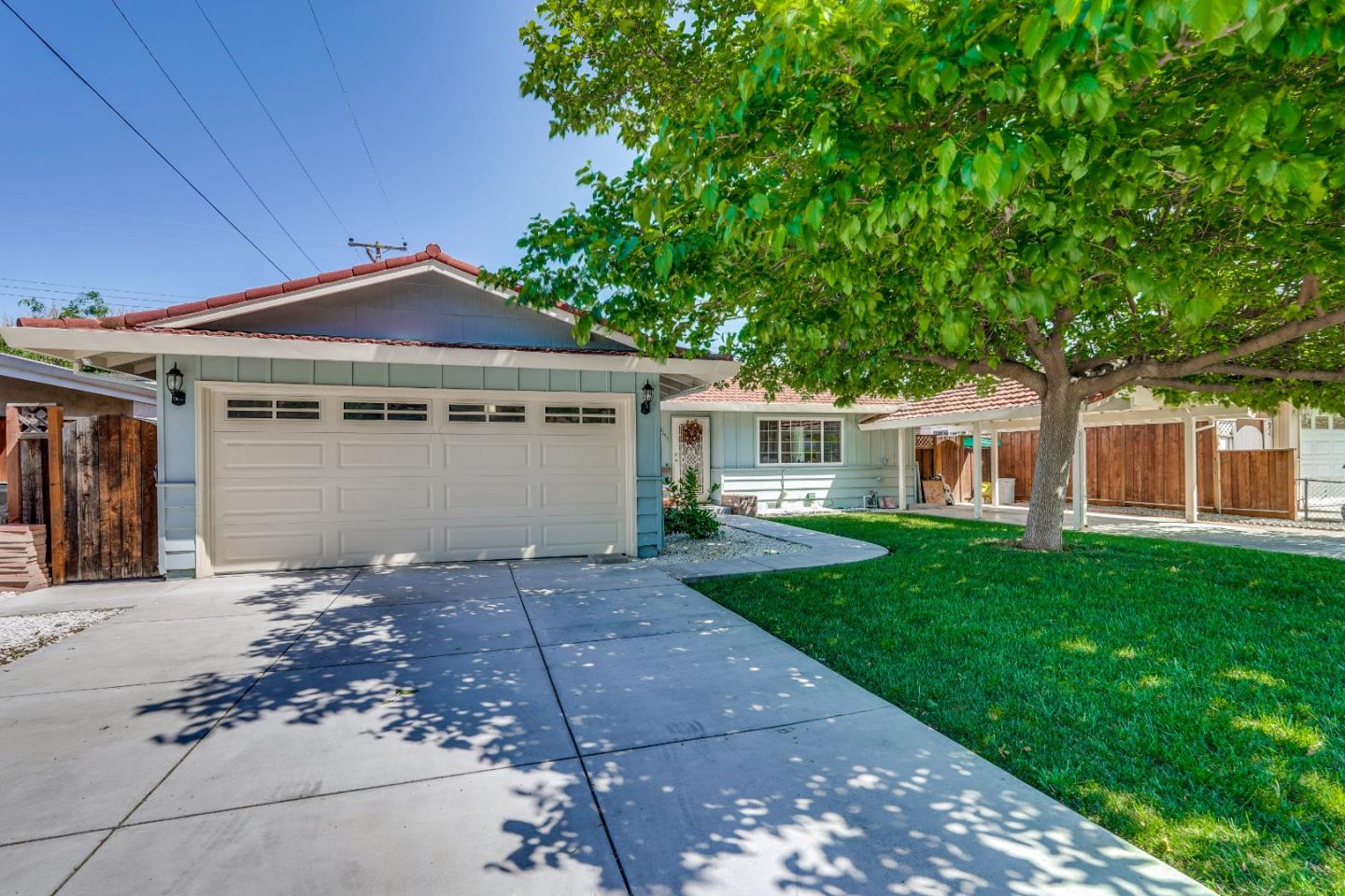 1755 Ravizza Avenue Santa Clara, CA 95051 - Photo 3 of 36 a front view of a house with a garden