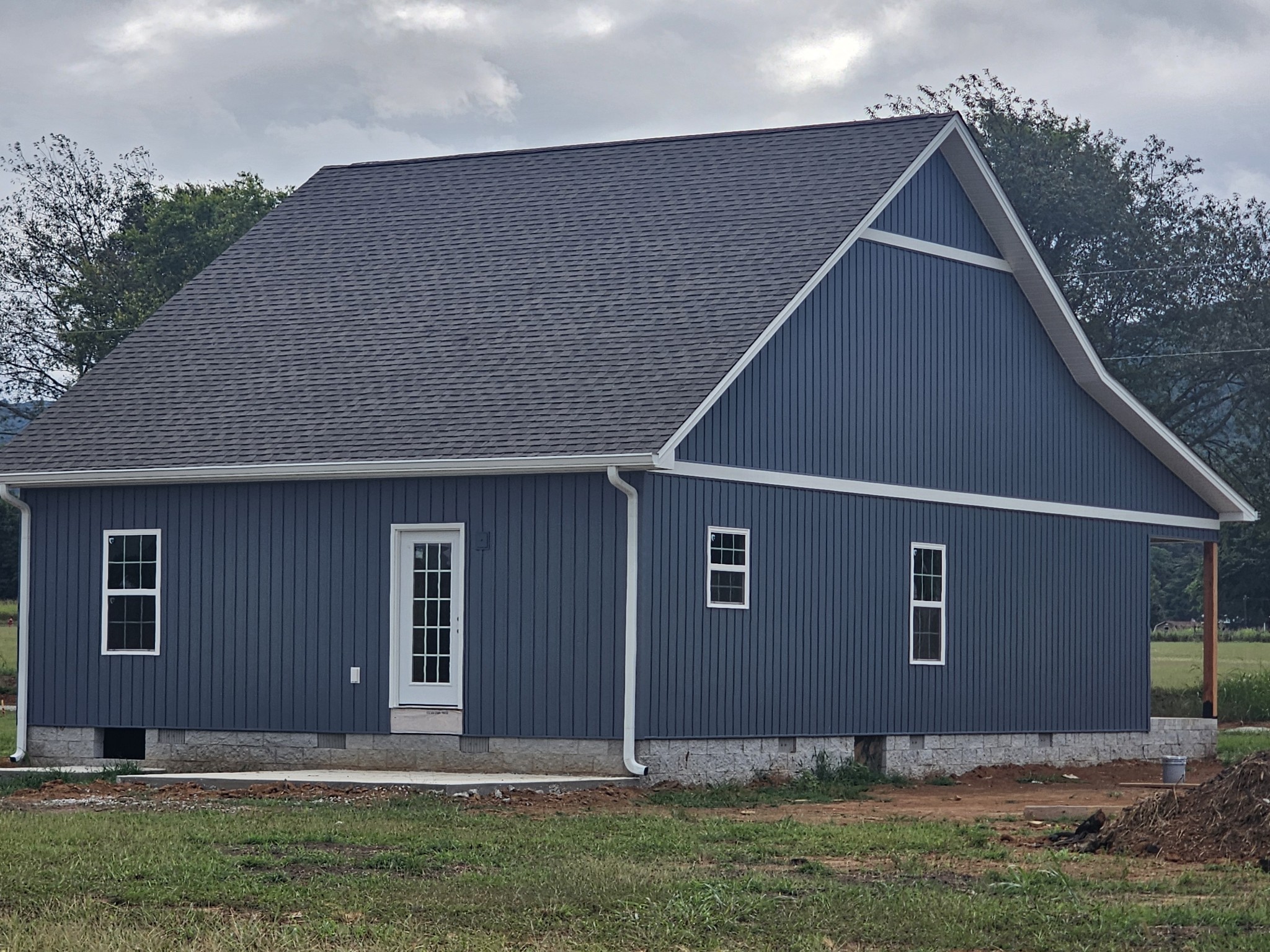 0 Blue Spring Road Decherd, TN 37324 - Photo 2 of 8 a front view of house with yard