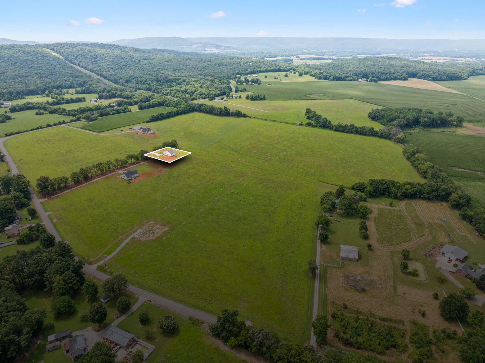 0 Blue Spring Road Decherd, TN 37324 - Photo 6 of 8 an aerial view of a houses with ocean view