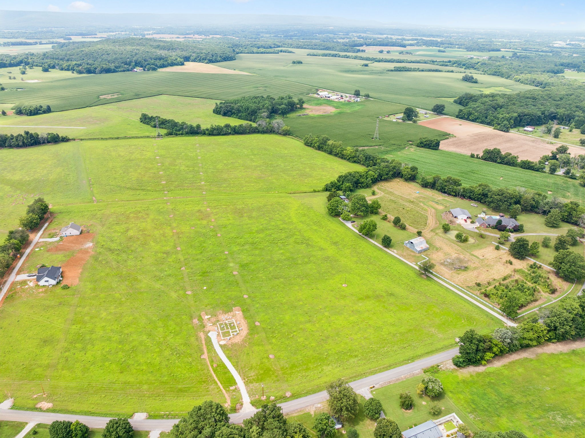 0 Blue Spring Road Decherd, TN 37324 - Photo 8 of 8 a view of a lake with a mountain
