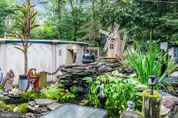 a aerial view of a house with swimming pool