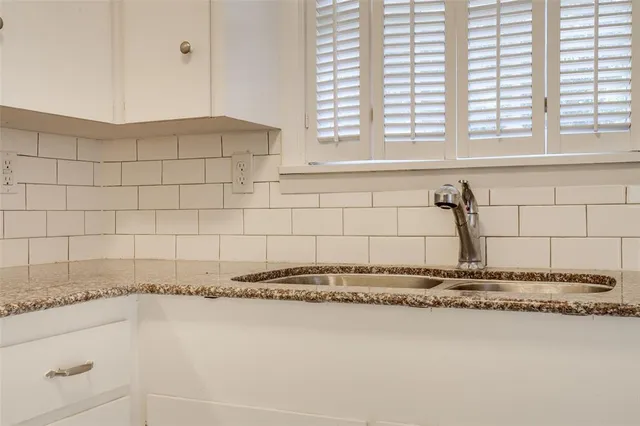 a utility room with closet dryer and washer