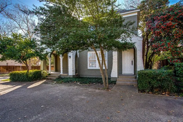 a view of a house with a street