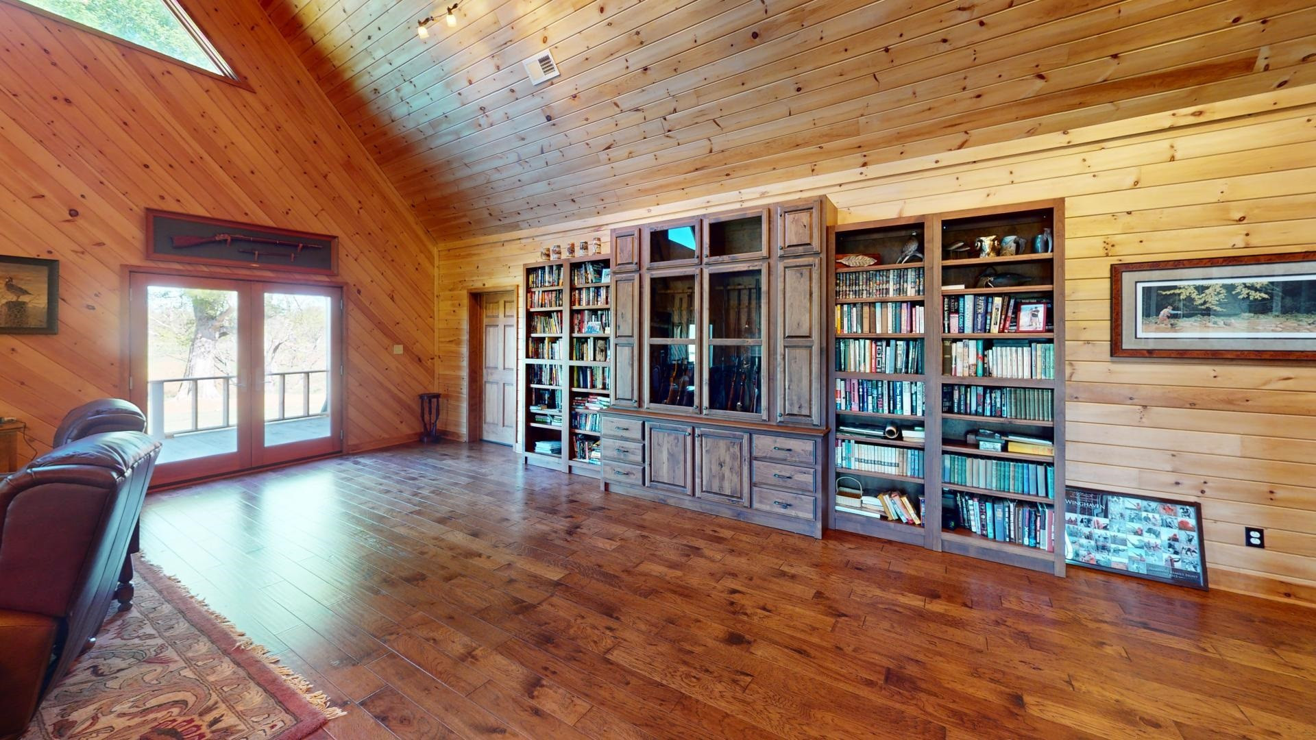 5334 Ira Barker Road Obion, TN 38240 - Photo 12 of 68 a room with furniture and book shelf