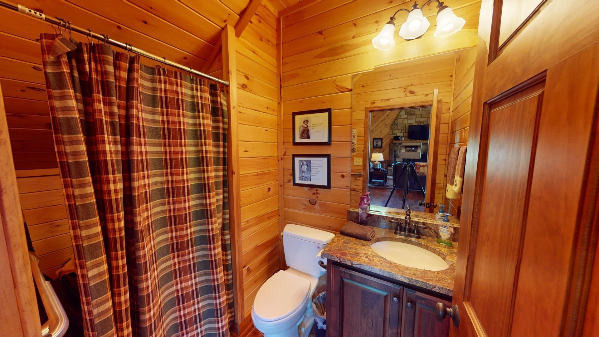 5334 Ira Barker Road Obion, TN 38240 - Photo 20 of 68 a bathroom with a granite countertop sink mirror vanity and toilet