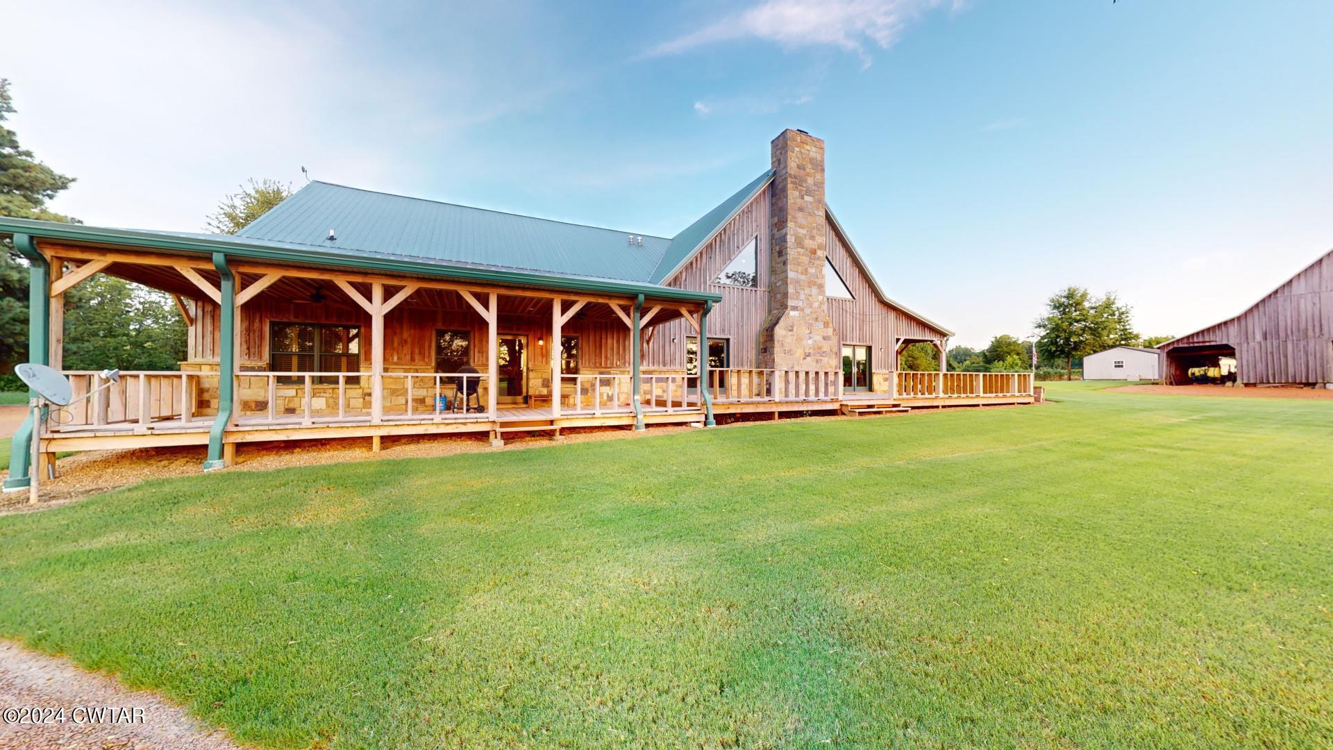 5334 Ira Barker Road Hornbeak, TN 38232 - Photo 2 of 69 a view of an house with swimming pool