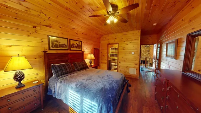 a kitchen with wooden cabinets and stainless steel appliances