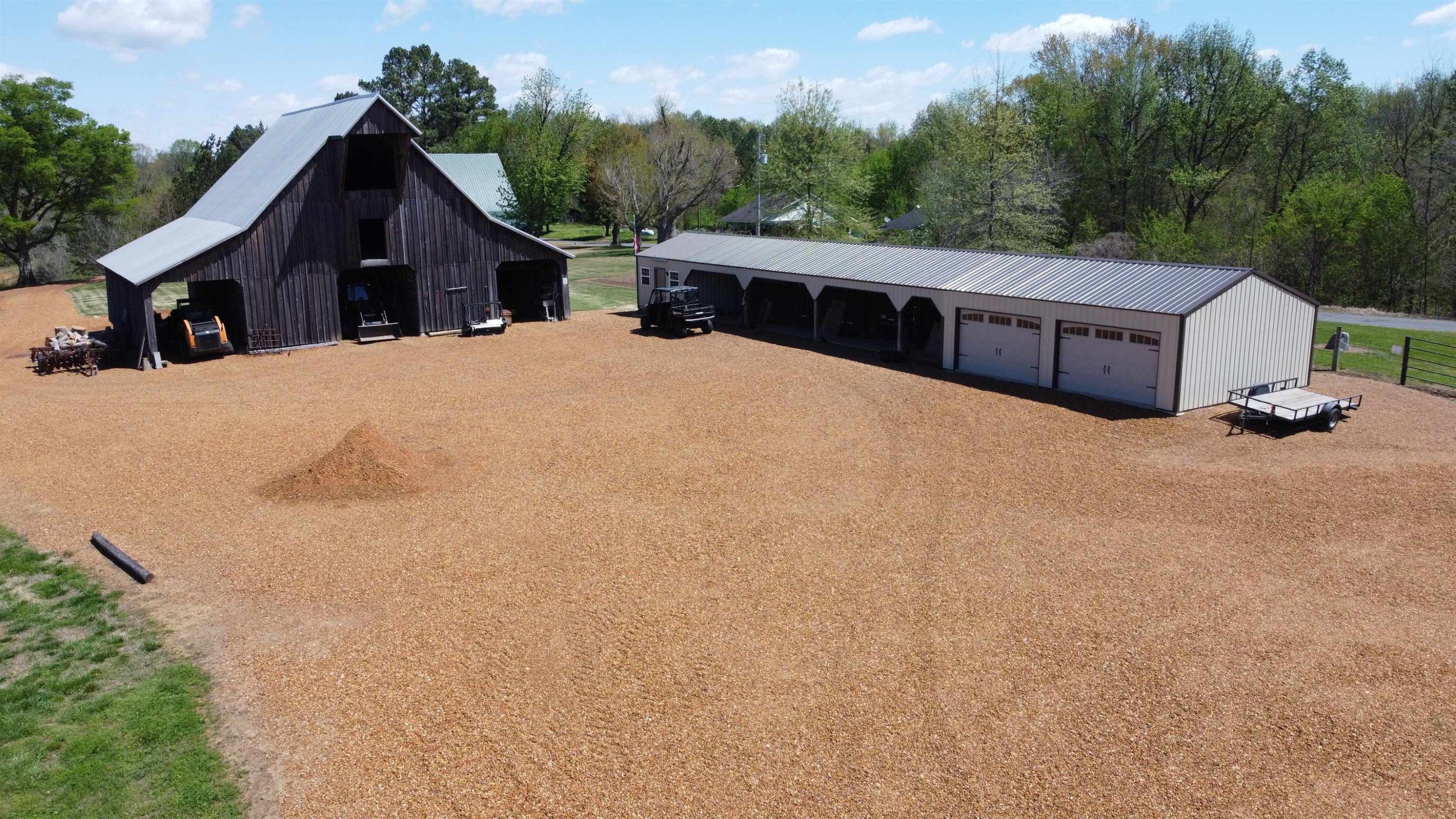 5334 Ira Barker Road Obion, TN 38240 - Photo 35 of 68 a view of house with yard and trees in the background