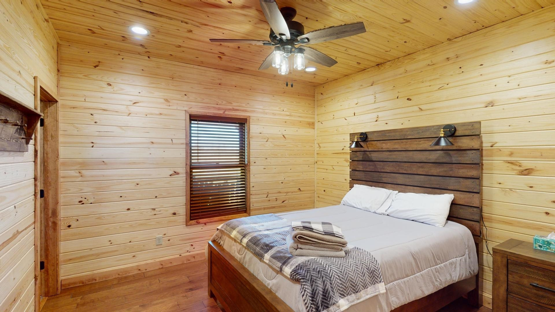 5334 Ira Barker Road Obion, TN 38240 - Photo 42 of 68 a bedroom with a bed and ceiling fan