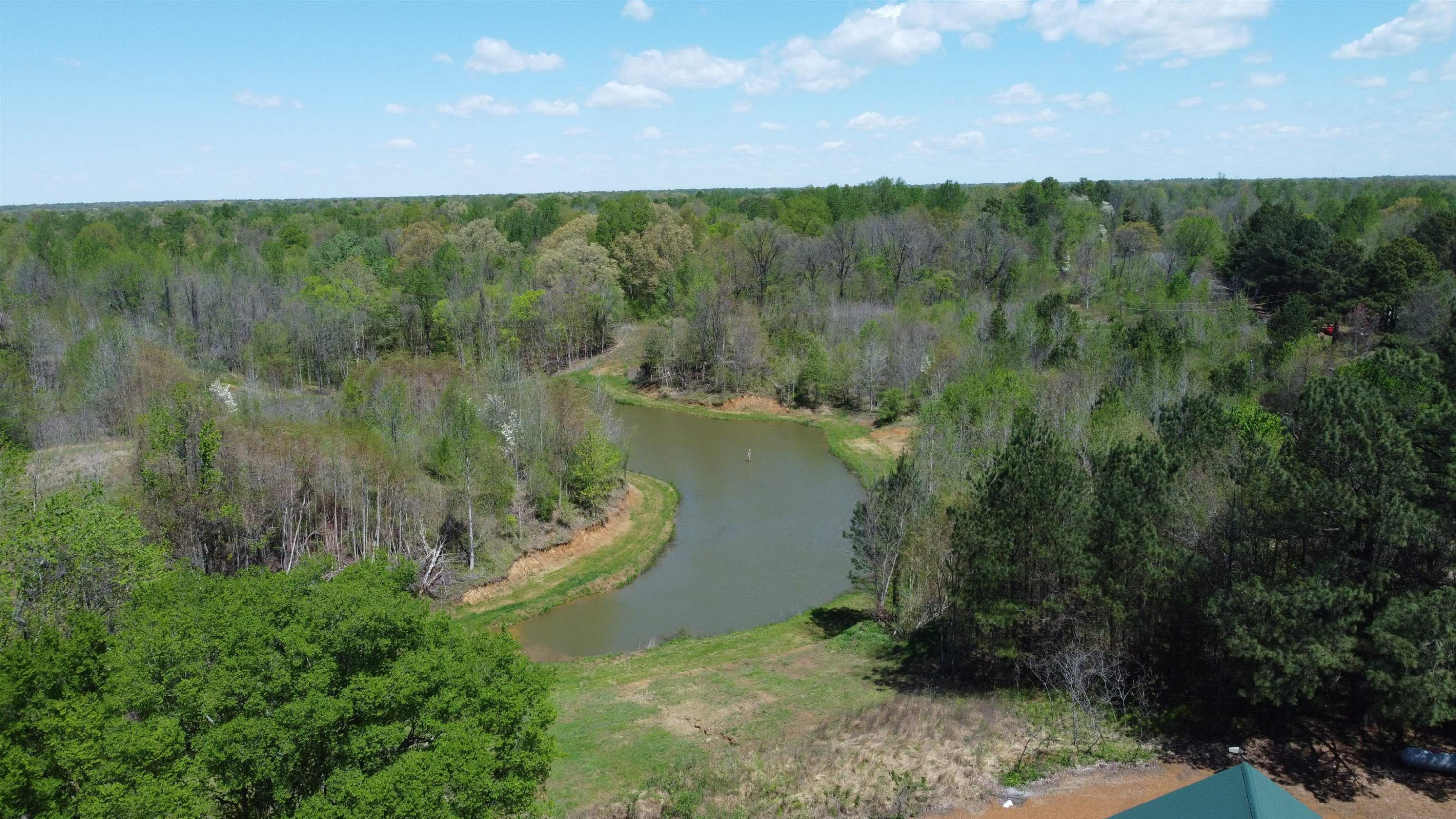 5334 Ira Barker Road Obion, TN 38240 - Photo 54 of 68 a view of a lake with a mountain in the background