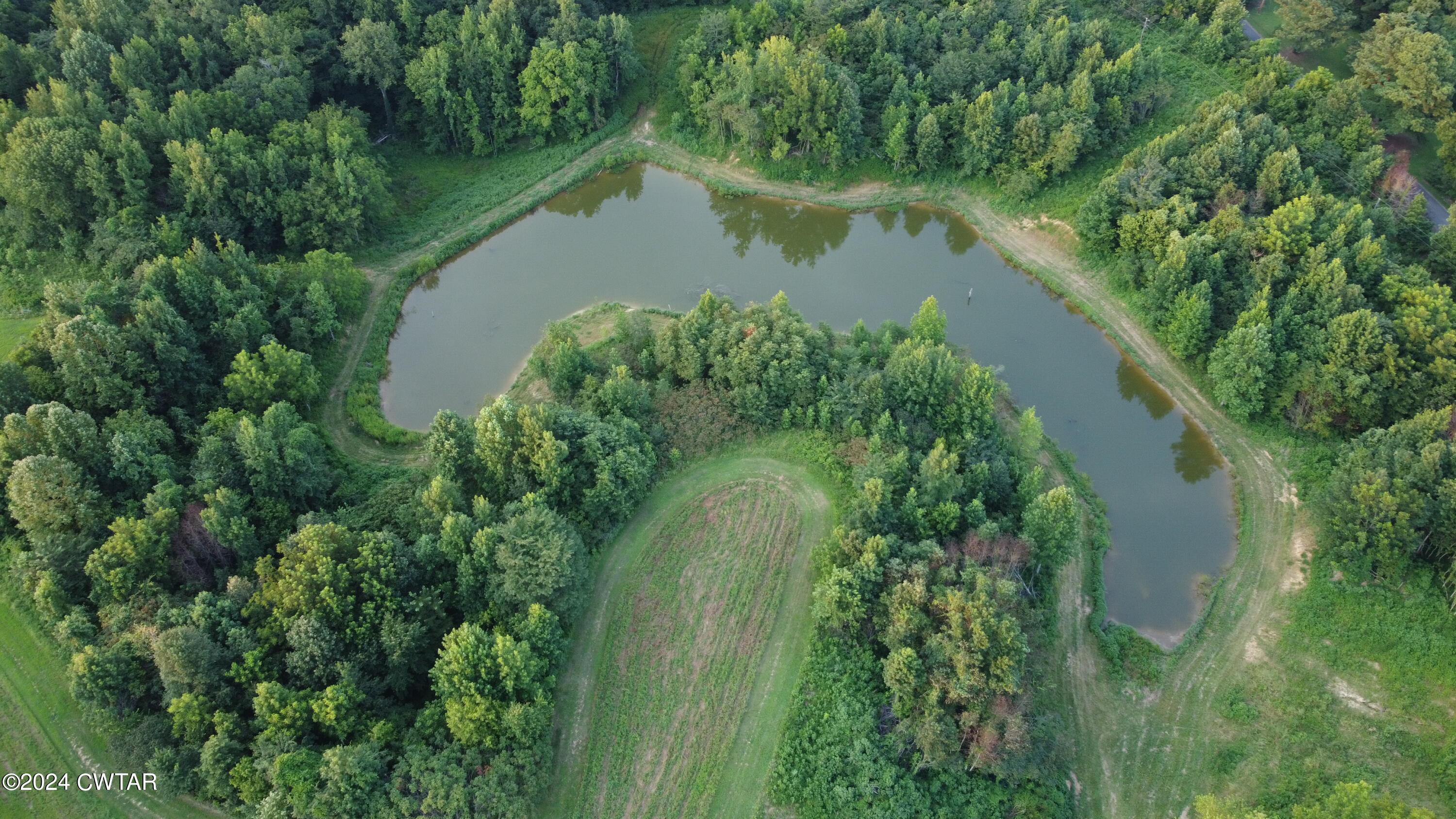 5334 Ira Barker Road Obion, TN 38240 - Photo 65 of 68 an aerial view of a house with a yard and outdoor seating