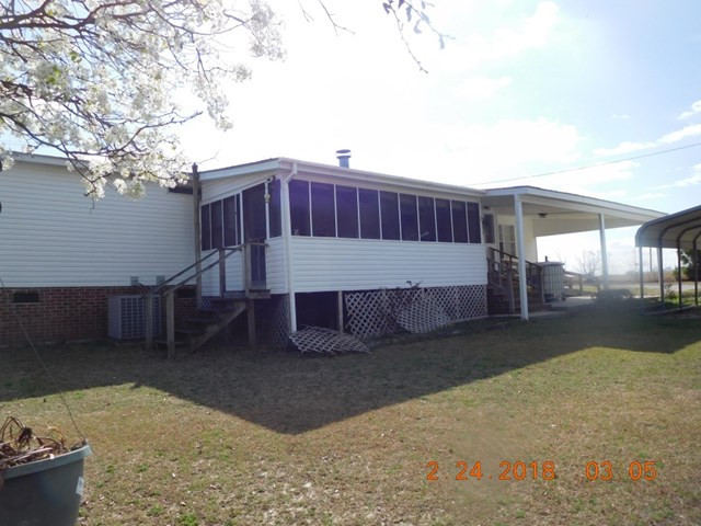 352 Lakeview Road La Grange, NC 28551 - Photo 16 of 18 Screened in Porch and Carport