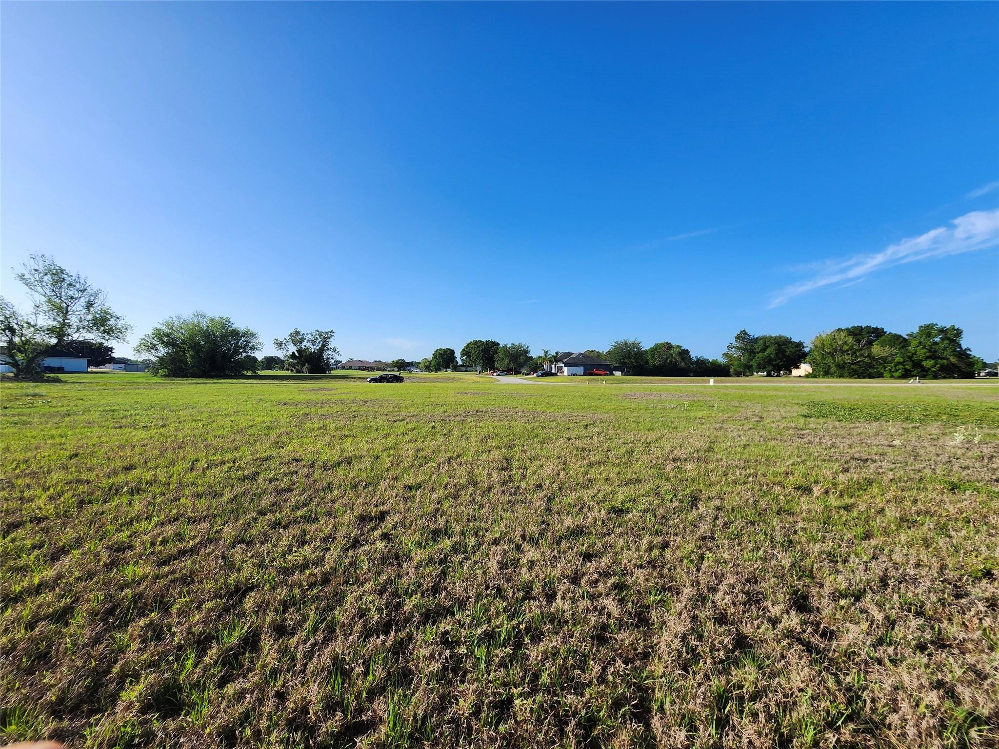 7933 Castile Road Sebring, FL 33876 - Photo 4 of 8 a view of yard with ocean view