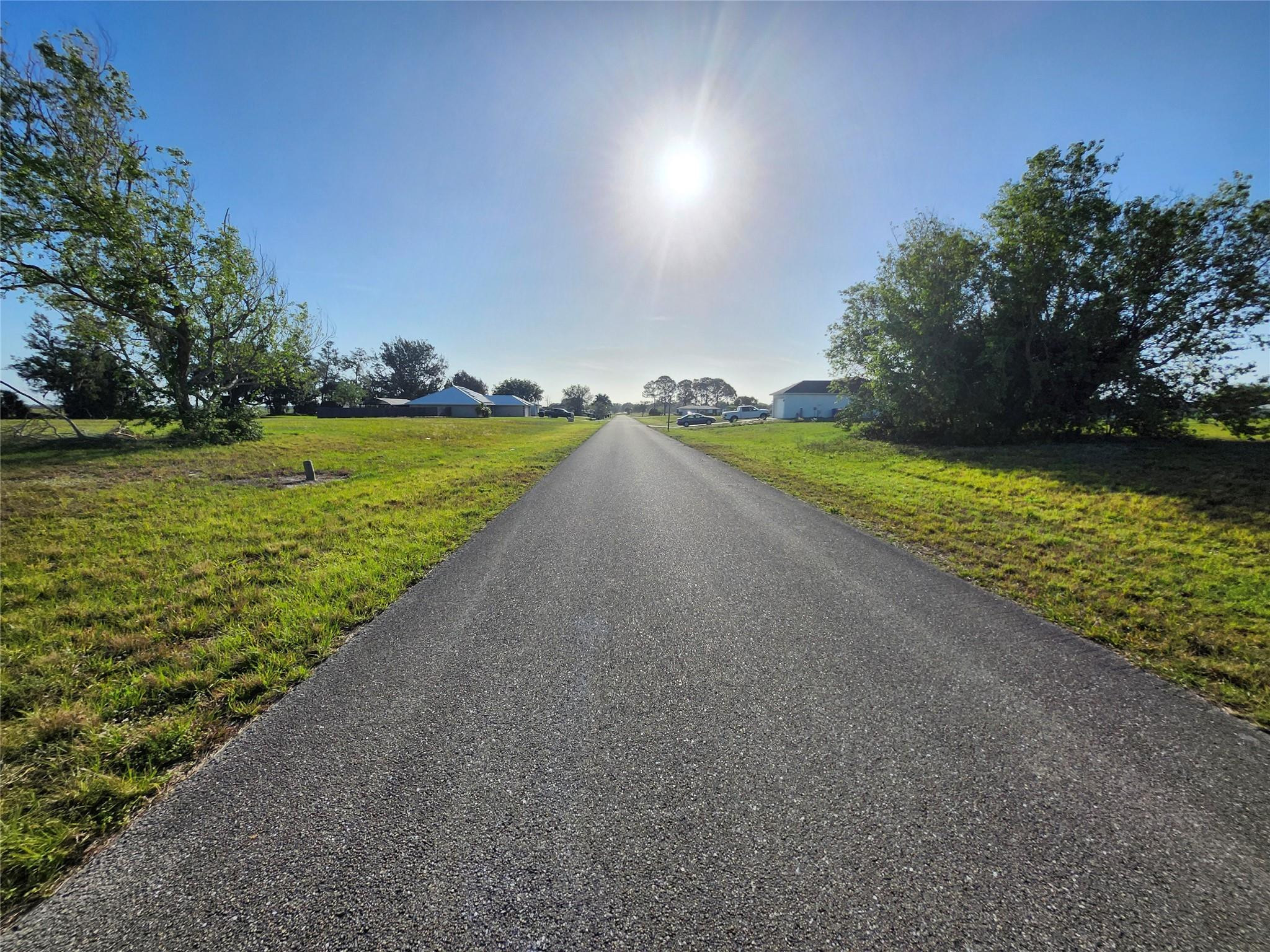 7933 Castile Road Sebring, FL 33876 - Photo 5 of 8 a view of a lake with outdoor space