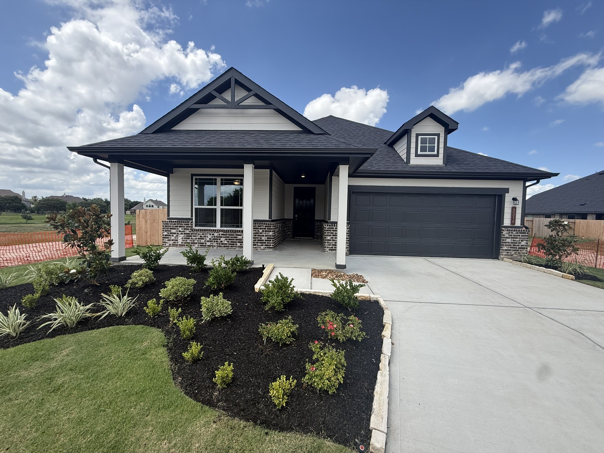 Welcome home to this stunning modern farmhouse, where classic charm meets contemporary design.