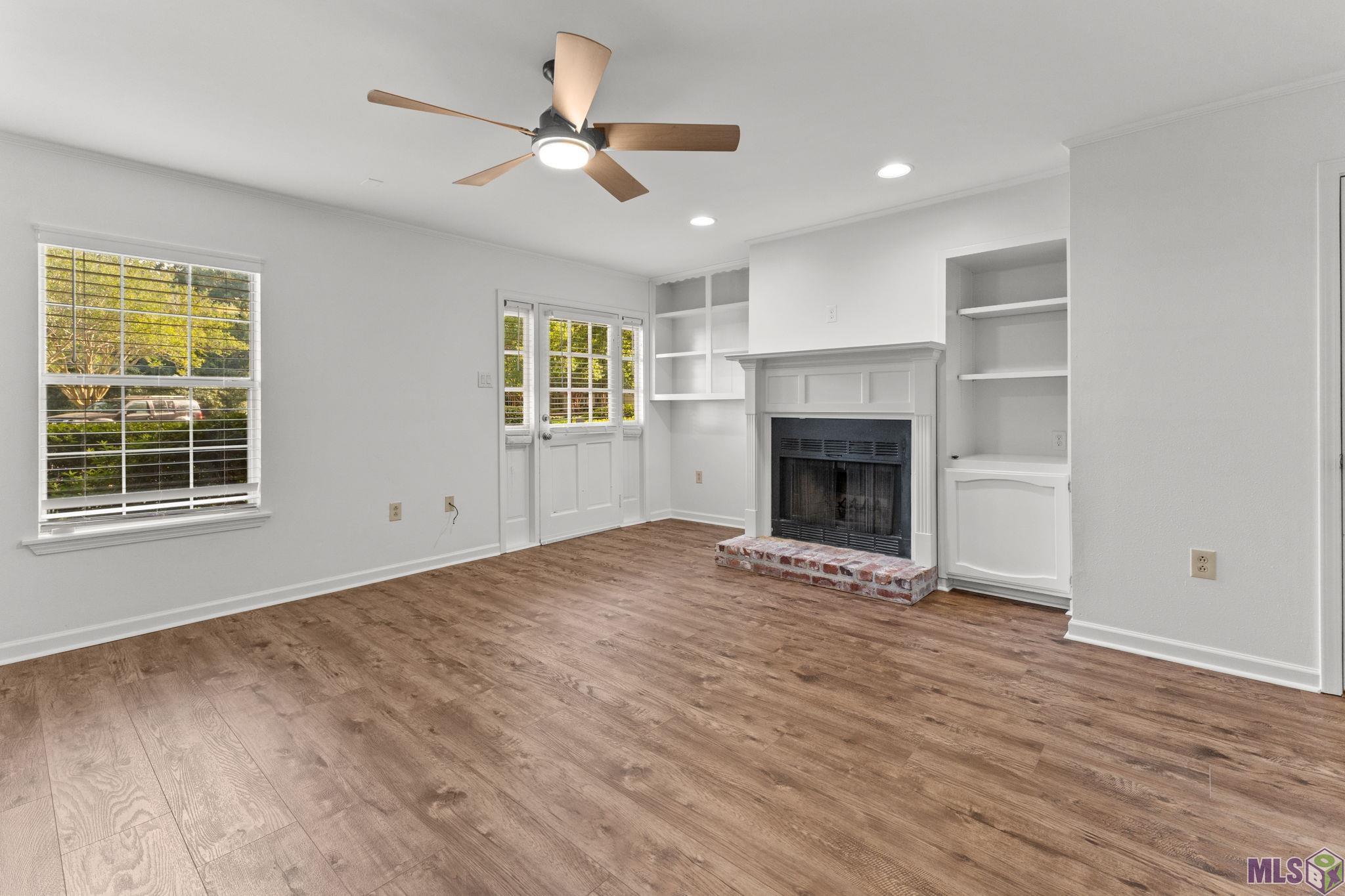 9007 Highland Road, Unit 18 Baton Rouge, LA 70810 - Photo 5 of 22 Living Room with Fireplace