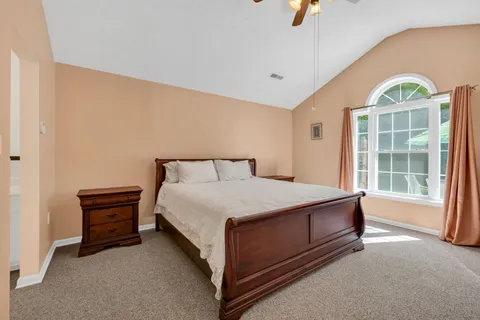 a white bath tub with a shower