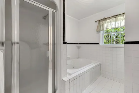 a bedroom with a bed and a closet