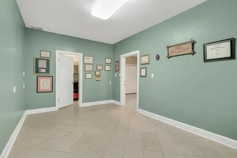 a utility room with sink dryer and washer