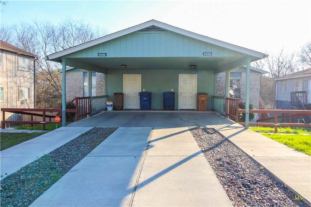 5405 Spring Meadow Road Austin, TX 78744 - Photo 1 of 1 a view of a house with a swimming pool and sitting area