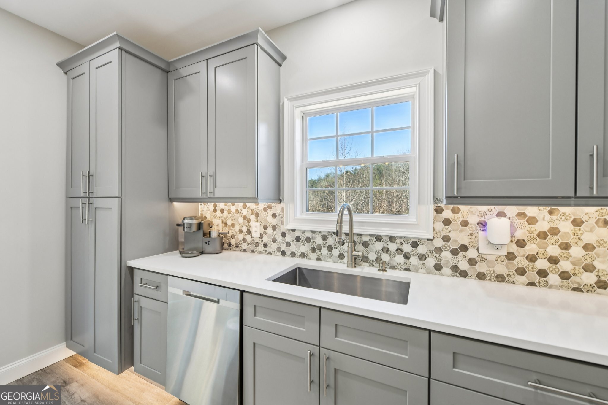 590 Ridge Road Dawsonville, GA 30534 - Photo 11 of 79 a bathroom with a sink and a window
