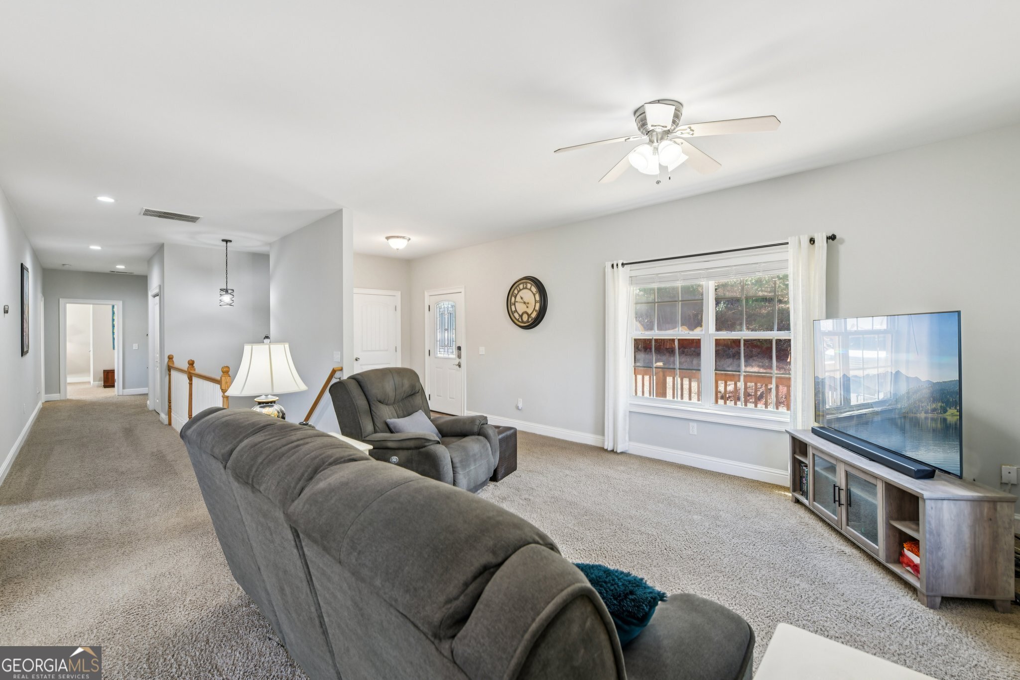 590 Ridge Road Dawsonville, GA 30534 - Photo 15 of 79 a living room with furniture and a window
