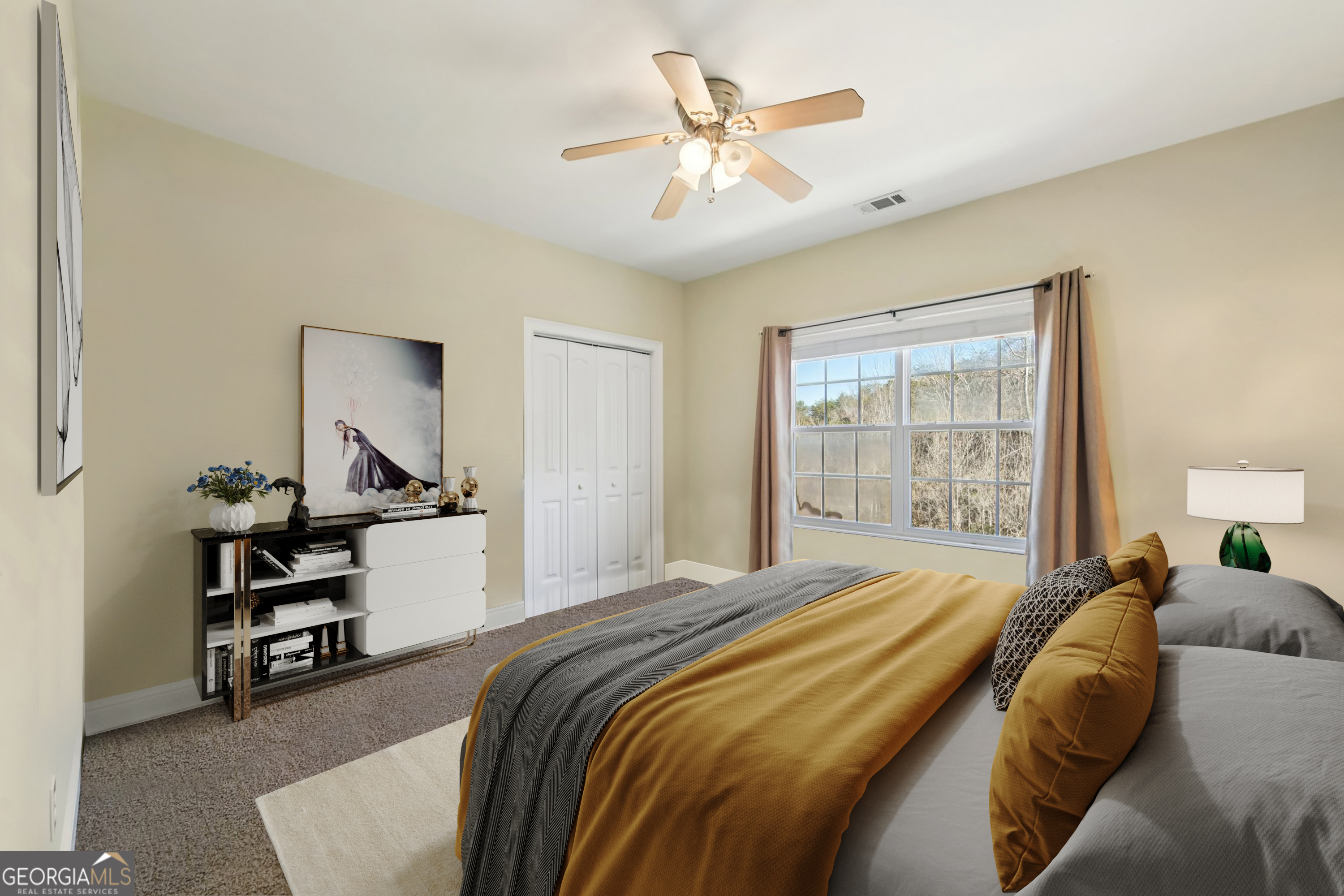 590 Ridge Road Dawsonville, GA 30534 - Photo 24 of 79 a bedroom with a bed a chandelier and window