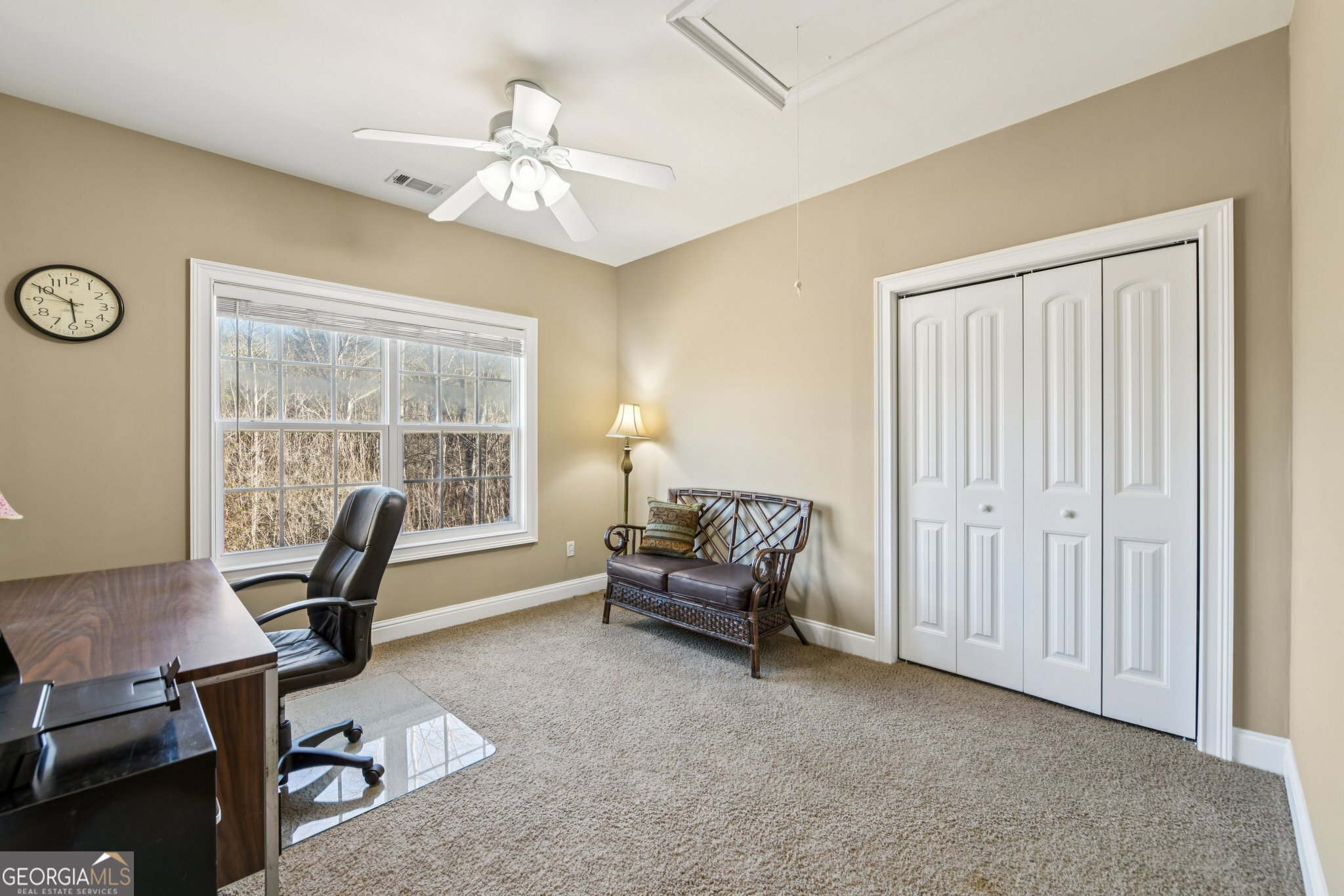 590 Ridge Road Dawsonville, GA 30534 - Photo 29 of 79 a living room with furniture and a window
