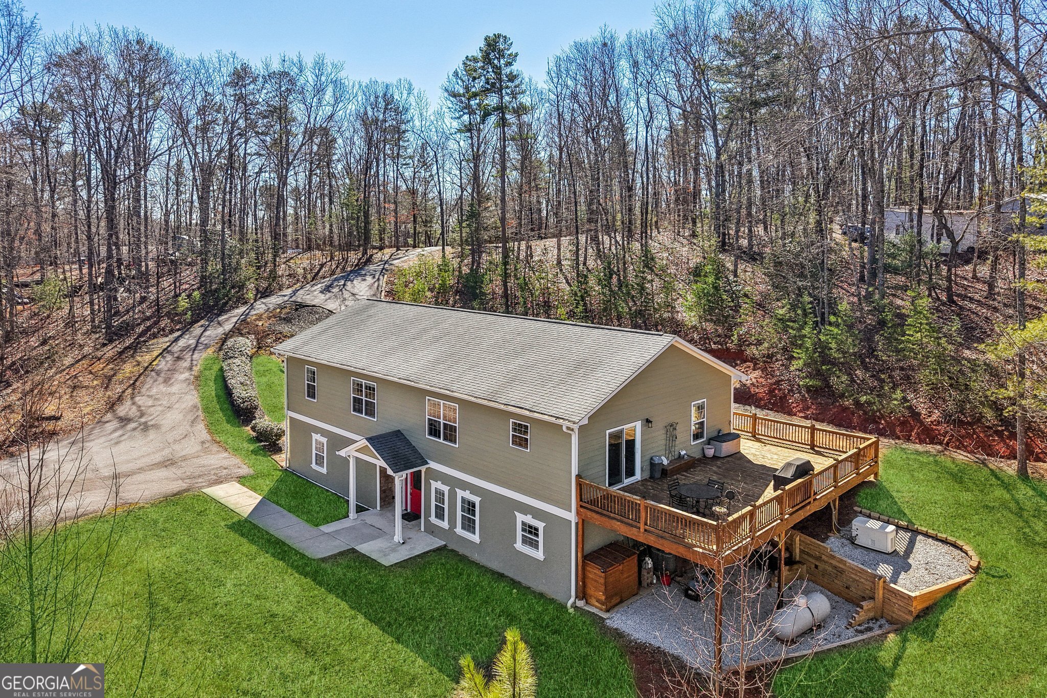 590 Ridge Road Dawsonville, GA 30534 - Photo 3 of 79 an aerial view of a house with backyard porch and furniture