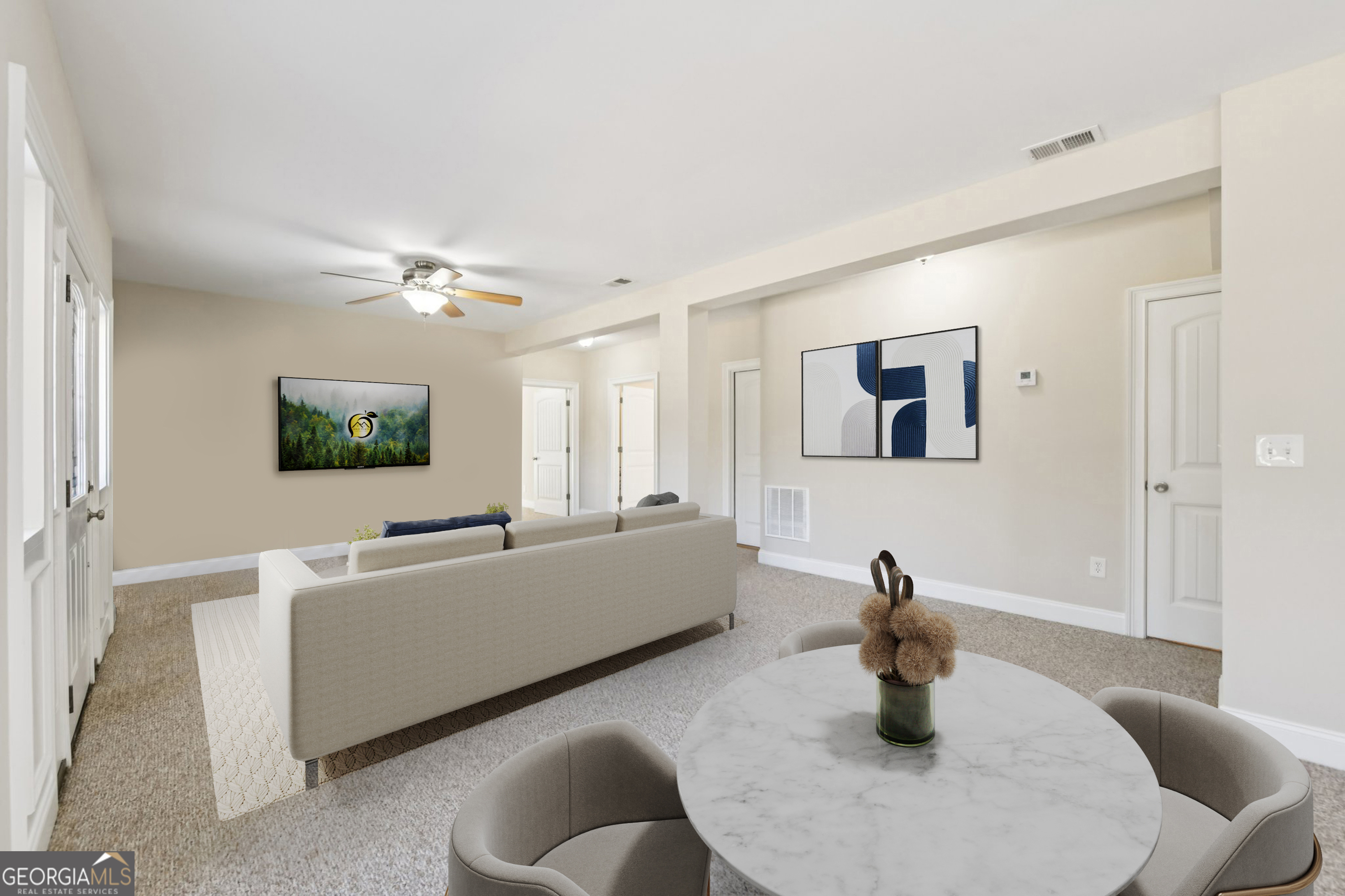 590 Ridge Road Dawsonville, GA 30534 - Photo 35 of 79 a living room with furniture and a flat screen tv