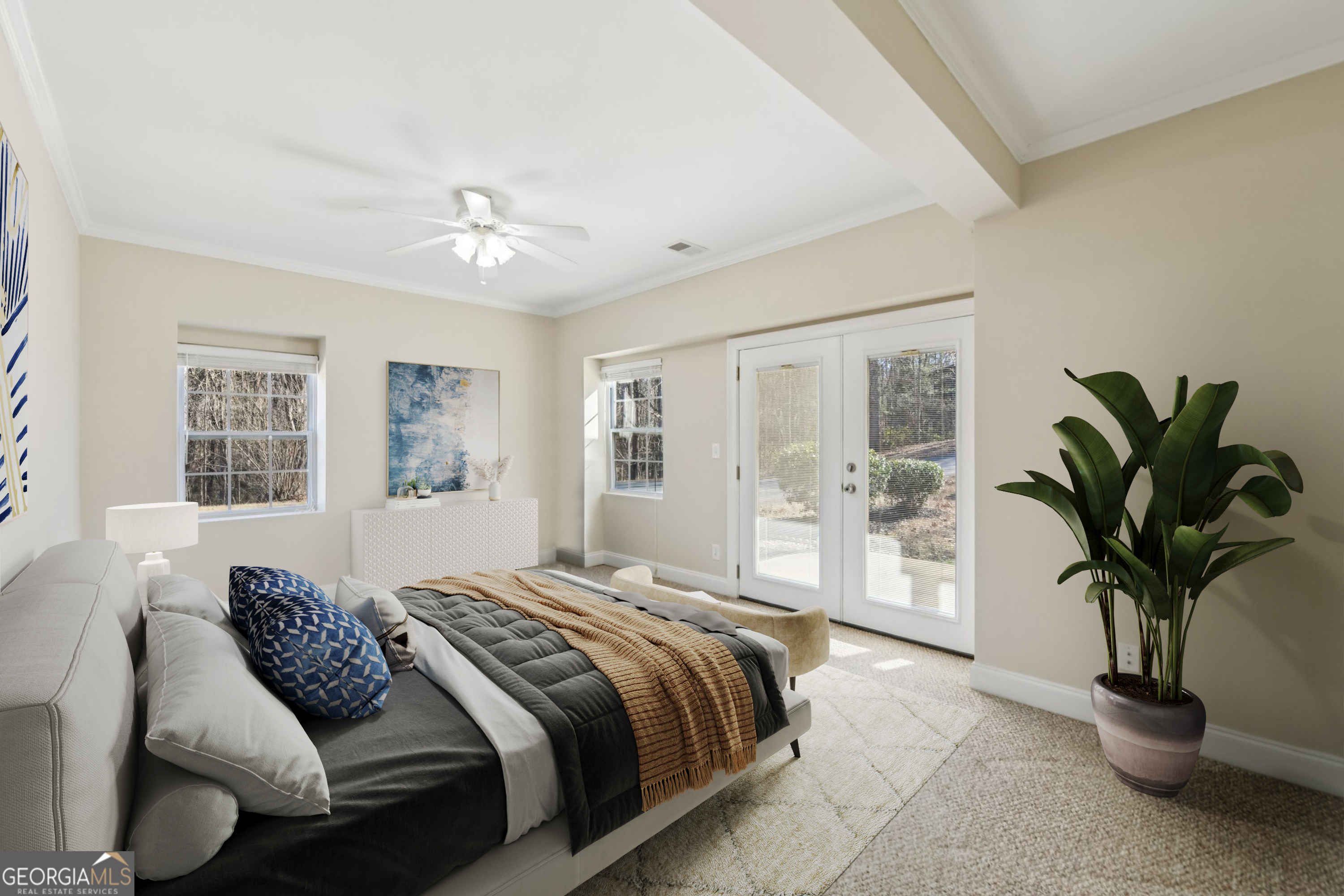 590 Ridge Road Dawsonville, GA 30534 - Photo 43 of 79 a bedroom with a large bed and a potted plant