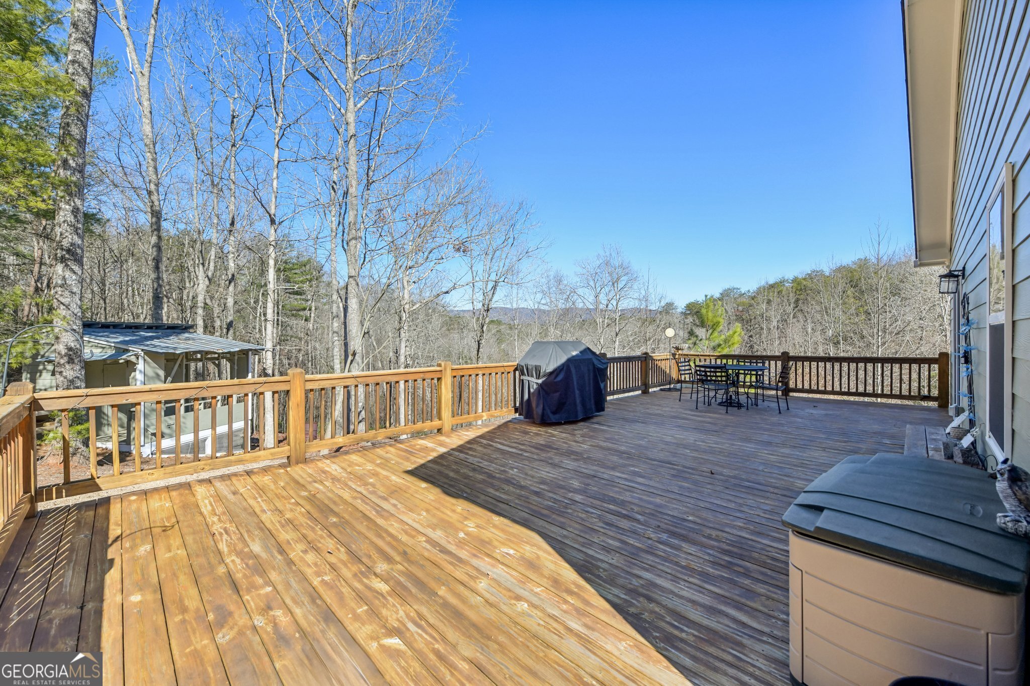 590 Ridge Road Dawsonville, GA 30534 - Photo 57 of 79 a view of balcony with two chairs and wooden floor